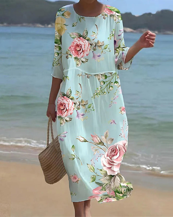 Nathalie | Graceful floral dress covering the belly