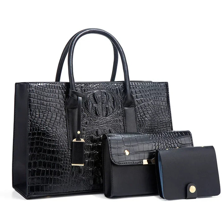 Règne | Elegant crocodile skin handbag, wallet and clutch set