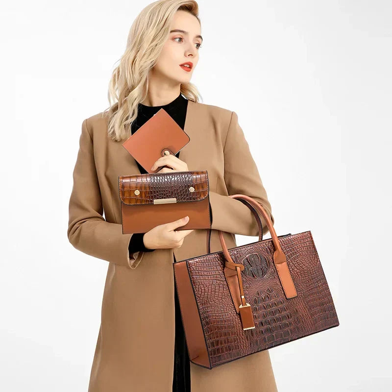 Règne | Elegant crocodile skin handbag, wallet and clutch set