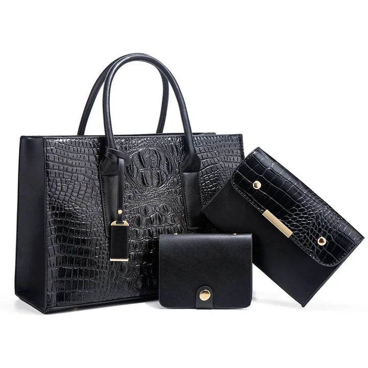 Règne | Elegant crocodile skin handbag, wallet and clutch set