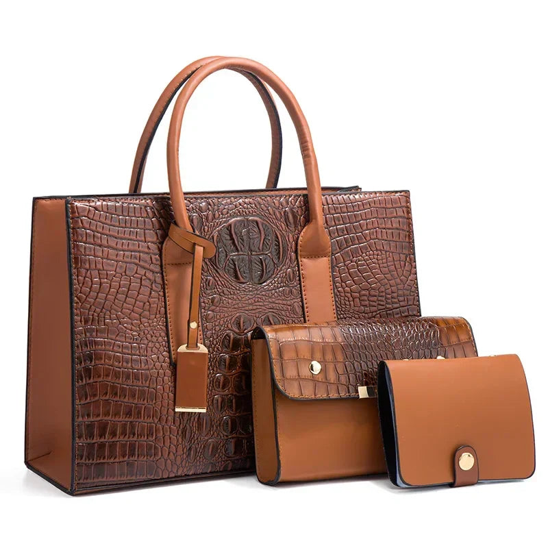 Règne | Elegant crocodile skin handbag, wallet and clutch set