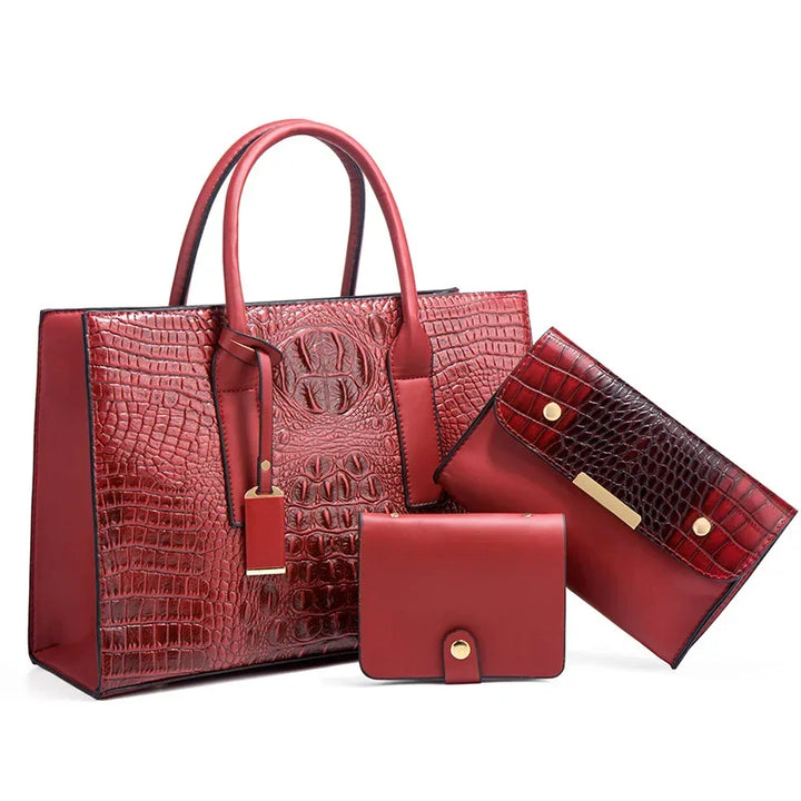 Règne | Elegant crocodile skin handbag, wallet and clutch set