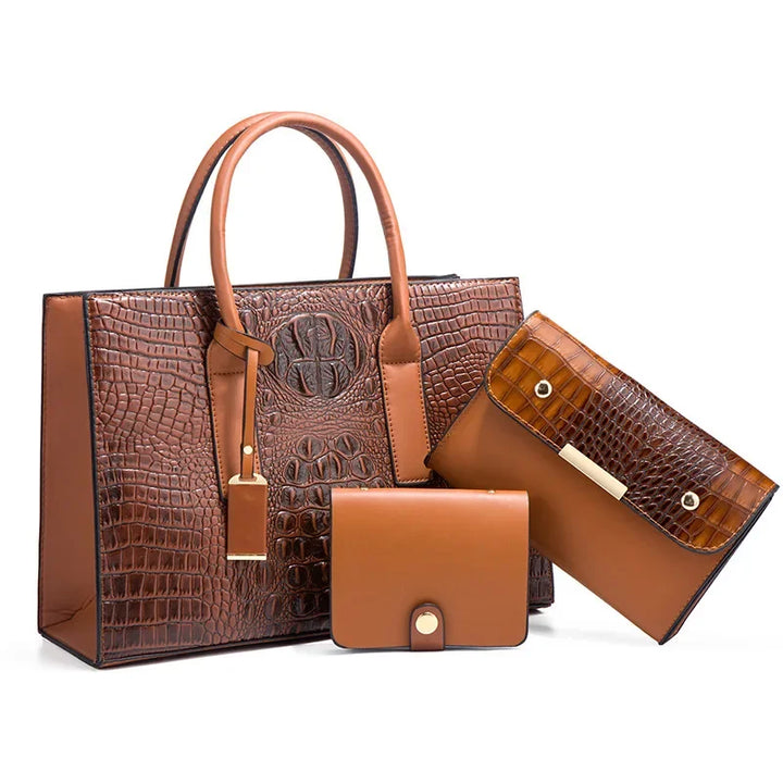 Règne | Elegant crocodile skin handbag, wallet and clutch set