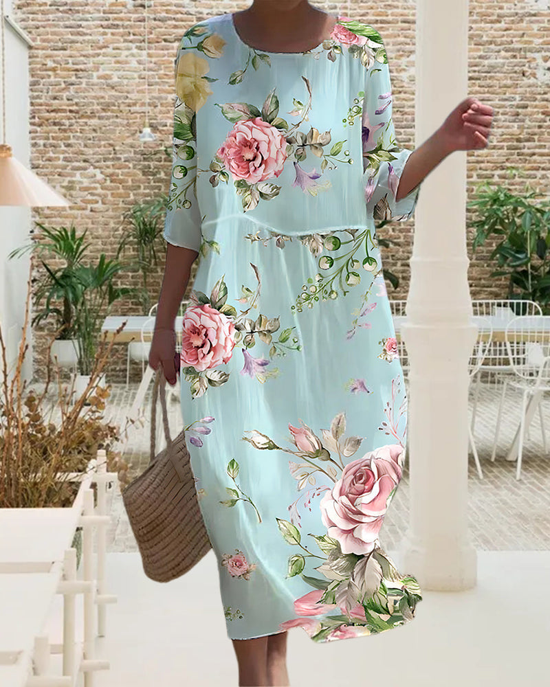 Nathalie | Graceful floral dress covering the belly